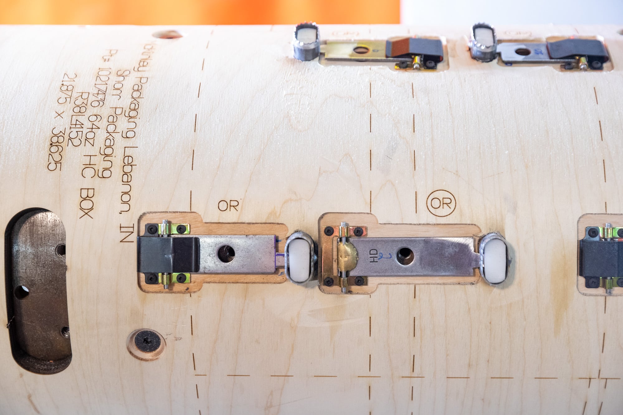 Dynamic Dies Incorporated female employee working with die